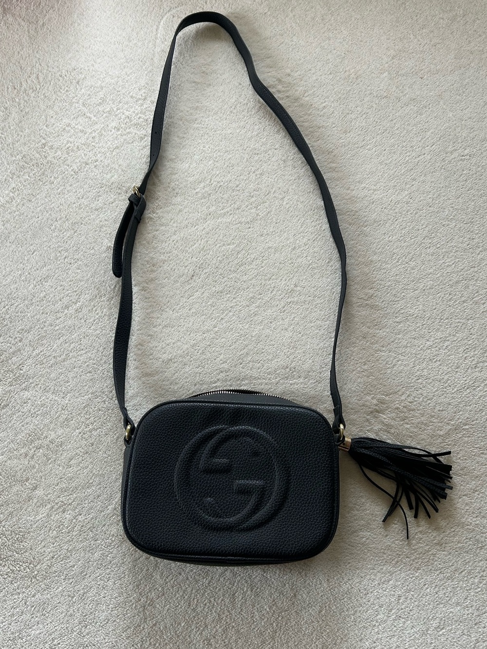Black Embossed Logo Leather Crossbody with Tassel